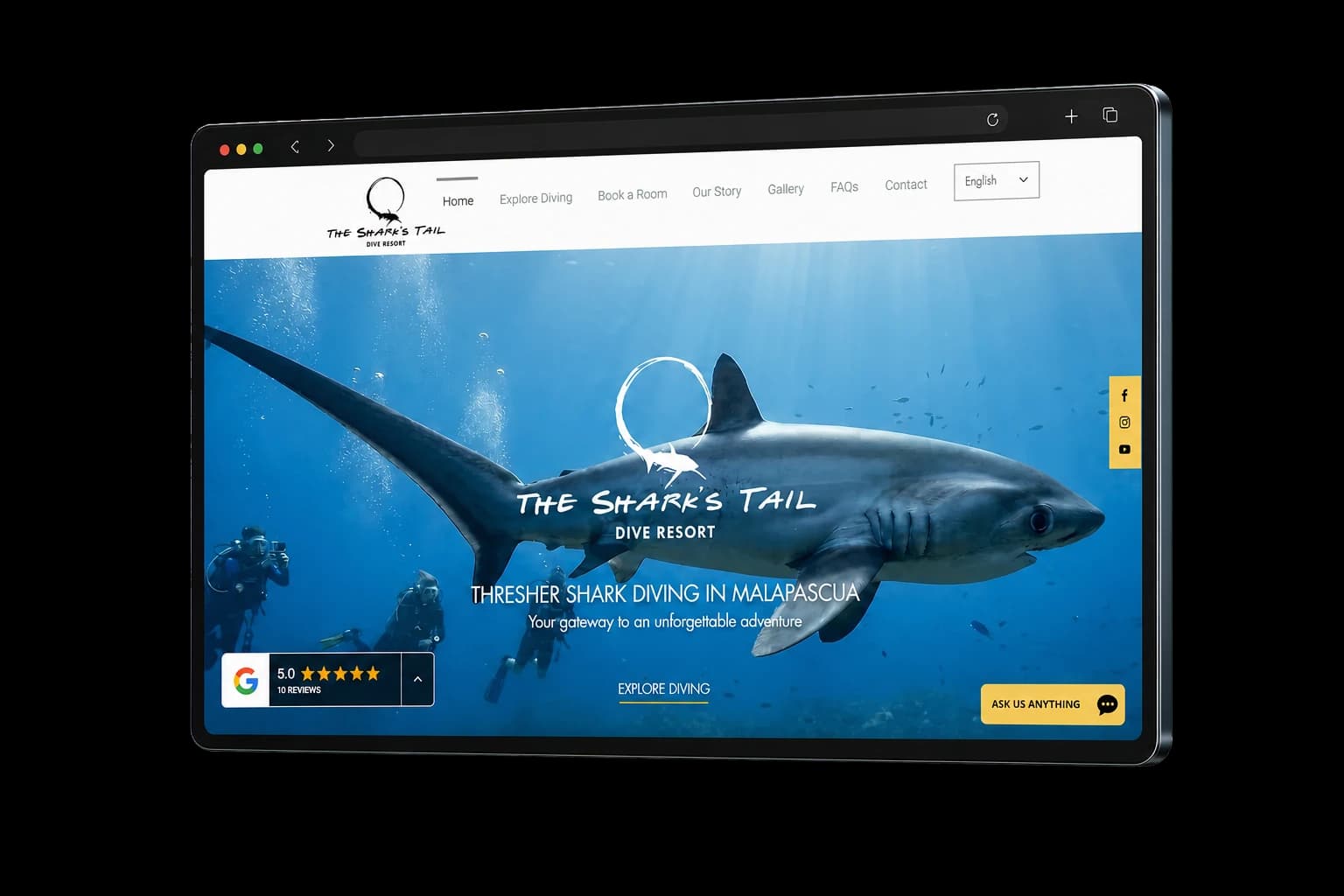 The Shark's Tail resort website displayed in a real cinematic browser frame